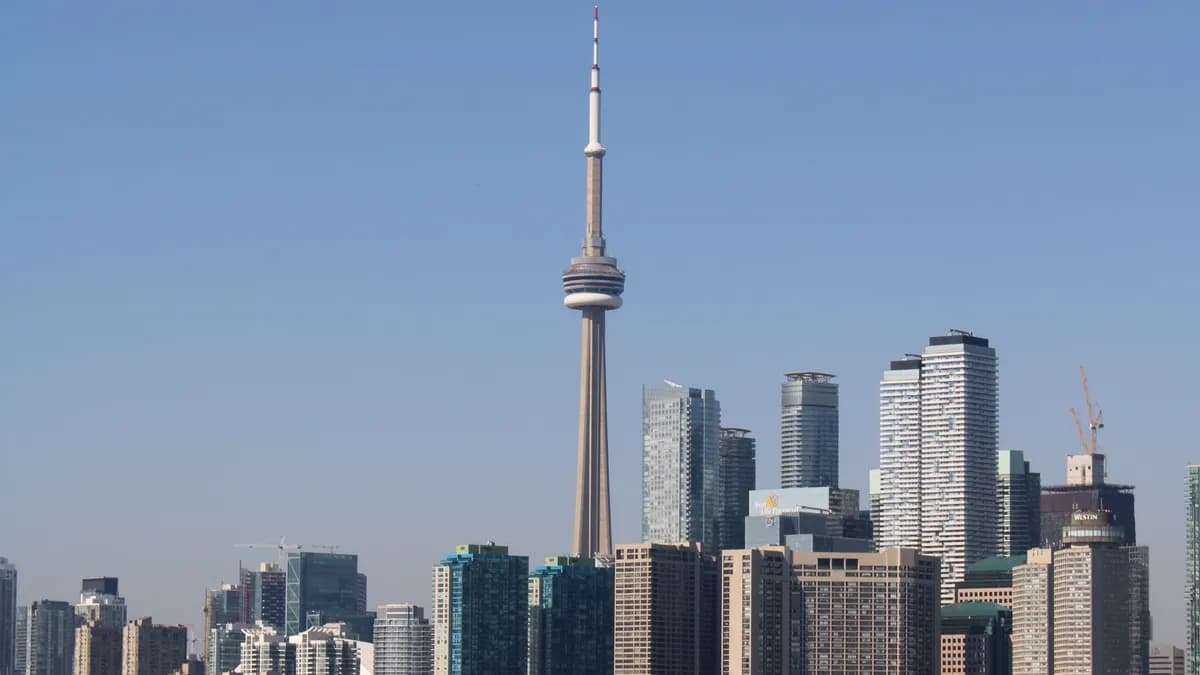 Toronto skyline with the CN Tower seen across Lake Ontario on a clear day